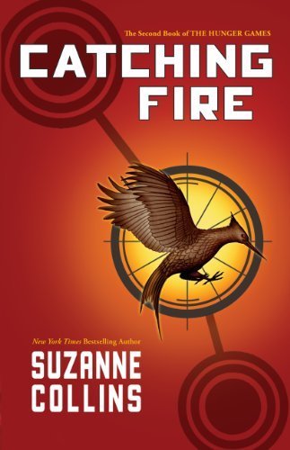 Catching Fire (Hunger Games) by Suzanne Collins (Lrg Edition) [Paperback(2012)]