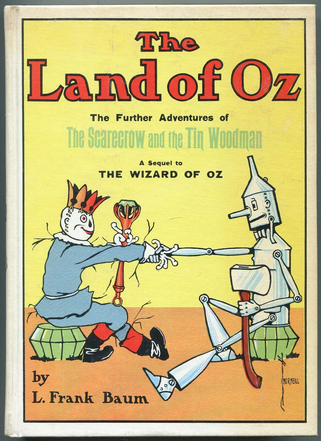 The Land of Oz: Being an Account of the Further Adventure of the Scarecrow and Tin Woodman and also the strange experiences of the Highly Magnified Woggle-Bug, Jack Pumpkinhead, the Animated Saw-Hors