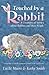 Touched by a Rabbit: A Treasury of Stories About Rabbits and Their People by Smith Kathy (2009-03-27)
