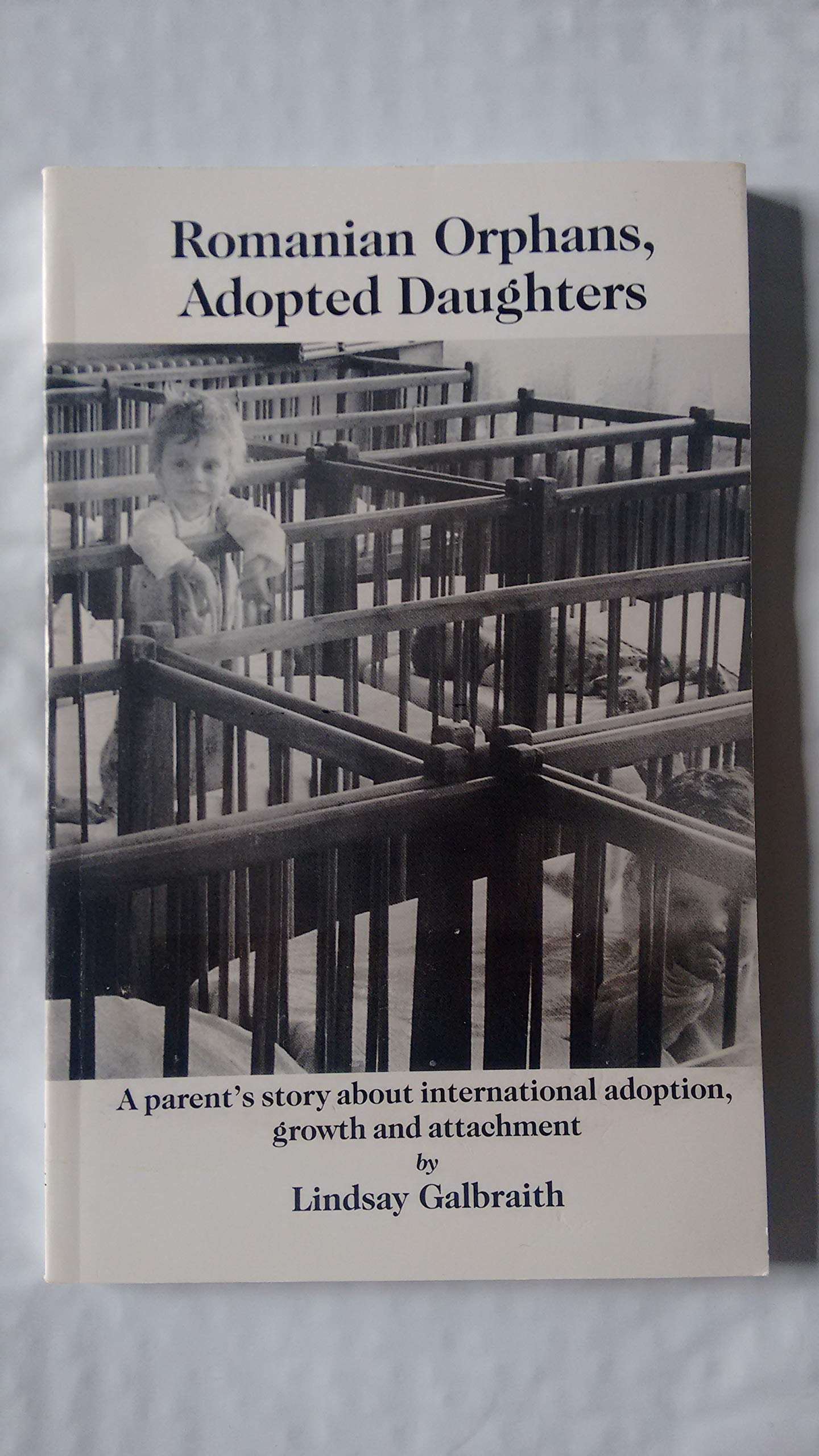 Romanian orphans, adopted daughters: A parent's story about international adoption, growth and attachment (Paperback)