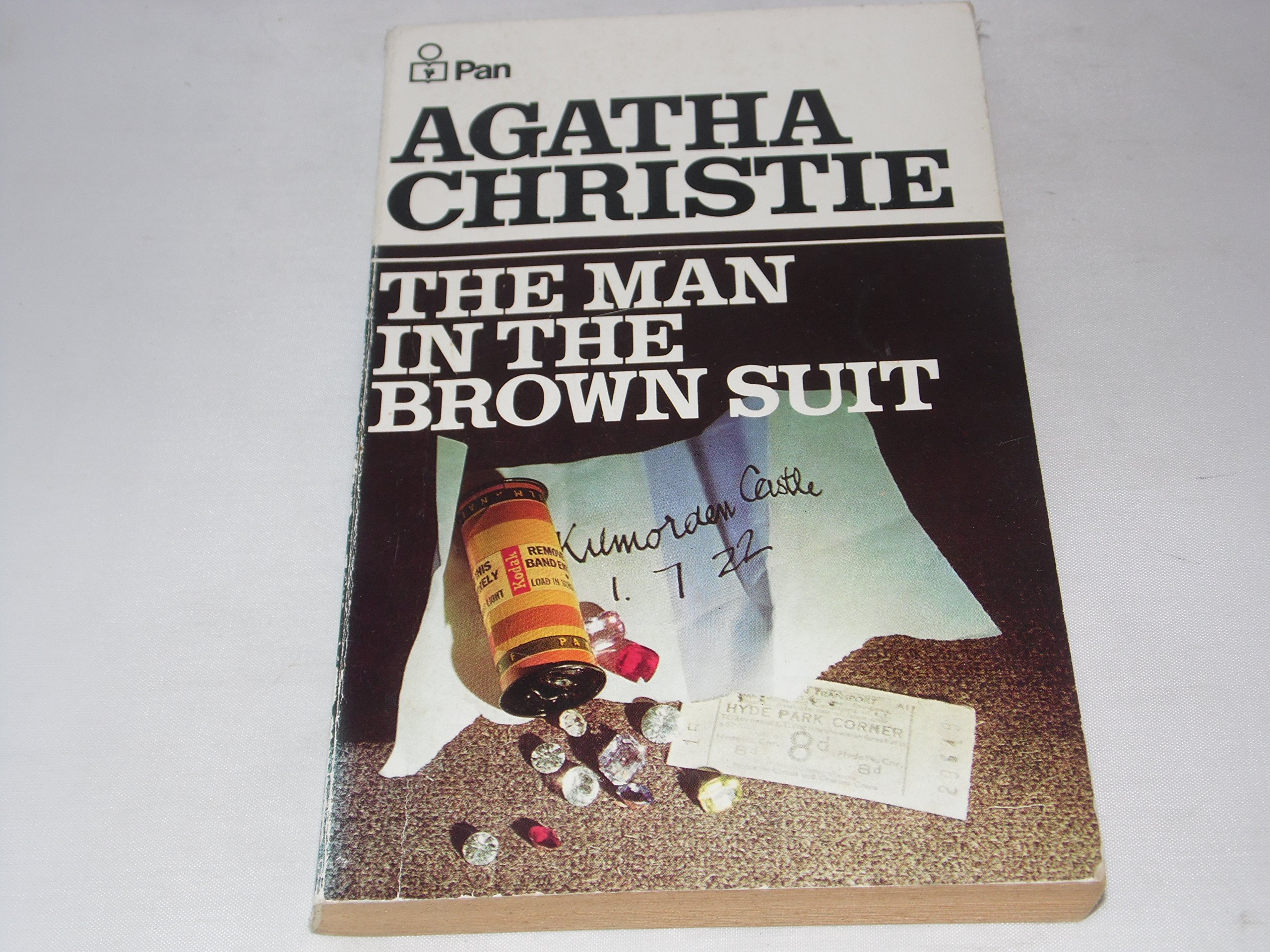 The man in the brown suit