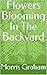 Flowers Blooming In The Backyard by Morris Graham