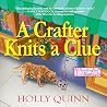 A Crafter Knits a Clue: A Handcrafted Mystery