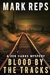 BLOOD BY THE TRACKS (Zeb Hanks Mystery Series)