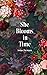 She Blooms in Time by Juniper Hartmann