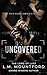 Uncovered: A Dark Bully Reverse Harem Romance (Satin and Silk Seductions)