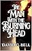 The Man with the Burning He...