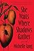 She Waits Where Shadows Gat...