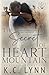 The Secret of Heart Mountain: A Childhood Enemies to Lovers Romance