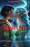 Book cover for Seduced By The Snow Siren (The Naughty North Pole Book 3)