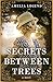 Secrets Between Trees by Amelia Legend