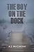 The Boy on the Dock by A.J. McCarthy