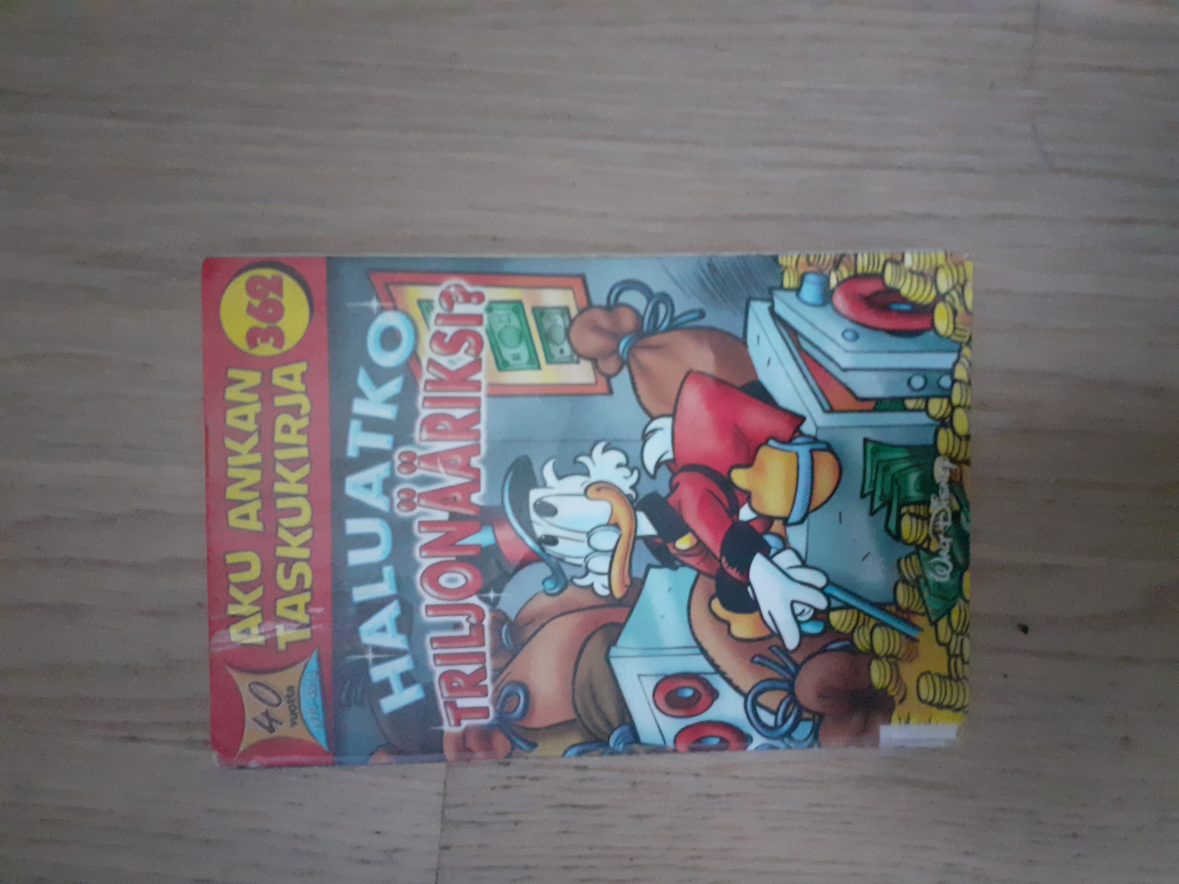 Haluatko triljonääriksi (Aku Ankan taskukirja, #362)