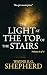 THE LIGHT AT THE TOP OF THE...