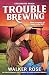 Trouble Brewing: An unputdownable, spicy enemies-to-lovers western romance (Crossroads Ranch)
