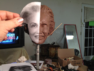 comparing clay to photograph