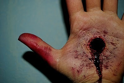  photo HolethroughHand_zps558f389a.jpg