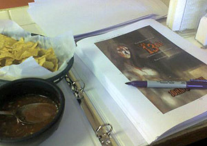 Signing the signature sheets for The 13th.