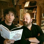 Neil showing me great Big Foot book at the amazing Drawn + Qu... on Twitpic