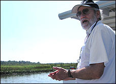 Ralph Eshelman, who helped lead the recovery of the artifacts in 1980, aboard a pontoon boat Sept 5. on the upper Patuxent River near the site where the wreck was found.