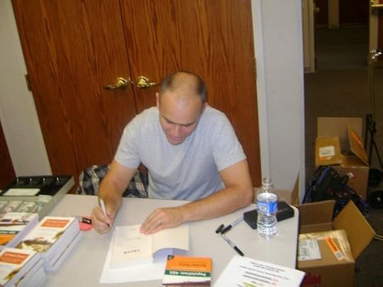 Signing books in Portland, Indiana