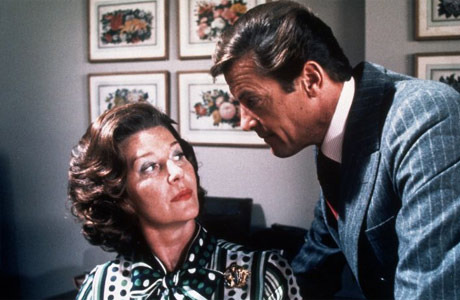 Lois Maxwell as Miss Moneypenny & Roger Moore as James Bond 007