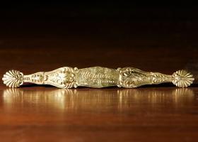 The Utopian Chocolates solid gold box decoration from the late 1800s was found near Orange and Cordova streets. By DARON DEAN, daron.dean@staugustine.com 