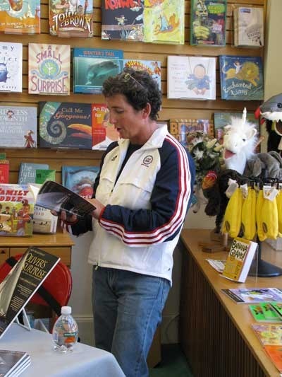 Carol-Newman-Cronin-reading-at-Eight-Cousins