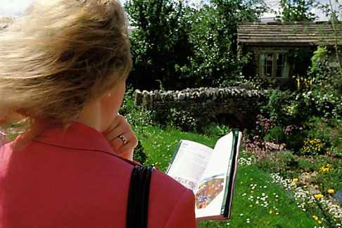 3-754-26 stock photo of England, Chelsea Flower Show, Yorkshire Forward Garden, Woman viewing garden