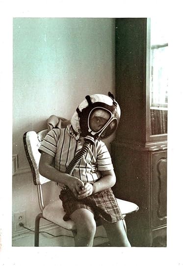boy wearing gasmask