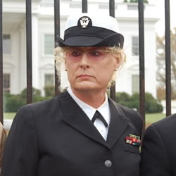Image: Autumn Sandeen on the White House Fence with GetEQUAL for the repeal of Don't Ask, Don't Tell (DADT; November 15, 2010)