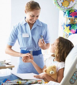 Nurse with girl patient