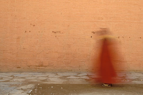 4-130-21 stock photo of Tibet, Monk circumambulating Labrang Monastery, Xiahe