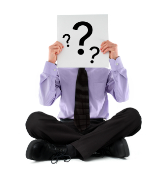 Photo of man with question mark covering his face