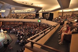 Children packed to overflowing in the auditorium