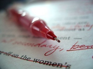 Red pen on page of typescript