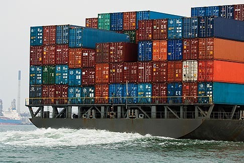 7-678-5285 stock photo of Shipping, Containers stacked on container ship, view from stern