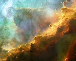 http://upload.wikimedia.org/wikipedia/commons/thumb/7/72/Omega_Nebula.jpg/250px-Omega_Nebula.jpg