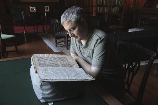 Conor Kostick reading Gerald of Wales's Topographia Hibernica, picture by Jurga Rakauskaite
