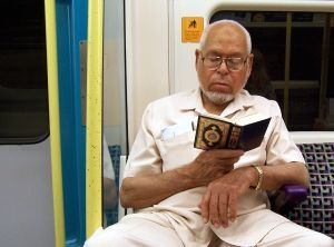man_reading_on_the_tube