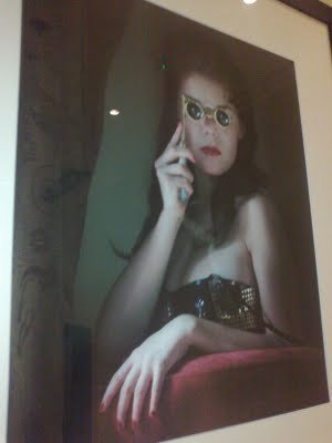 Opera-glasses woman in the gents at St Pancras