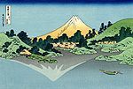 The Fuji reflects in Lake Kawaguchi, seen from the Misaka pass in the Kai province.jpg