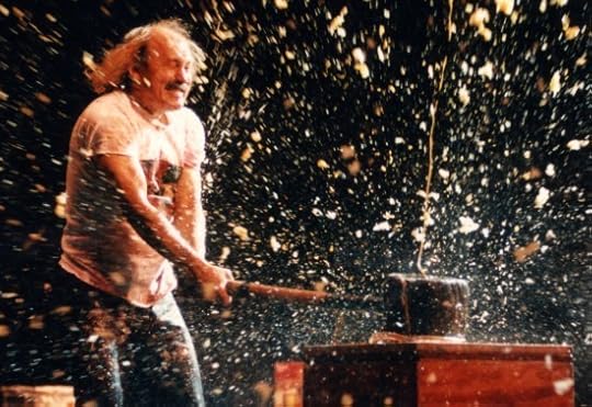 Gallagher smashing a watermelon.