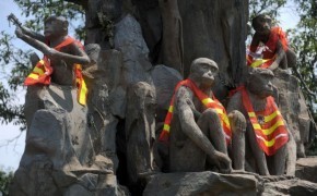 monkey statues enforce speed limit Monkeys To Enforce Speed Limits in China funny dog blog