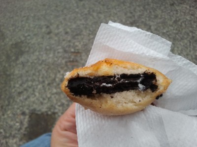 deep-fried Oreo with a bite taken out of it