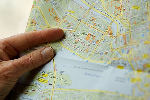 5-720-2652 stock photo of Sweden, Stockholm, Looking at the map