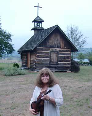 Sharyn McCrumb with Tom Dula's fiddle