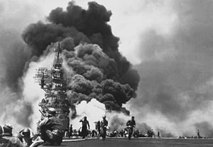 "USS BUNKER HILL hit by two Kamikazes in ...