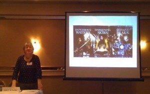 photo of talk, with slide of the latest cover art