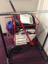 rolling cart of stuff for junk swap